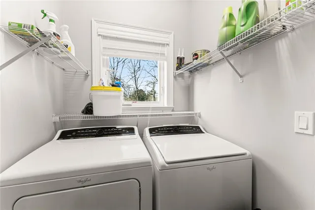 a utility room with dryer and washer