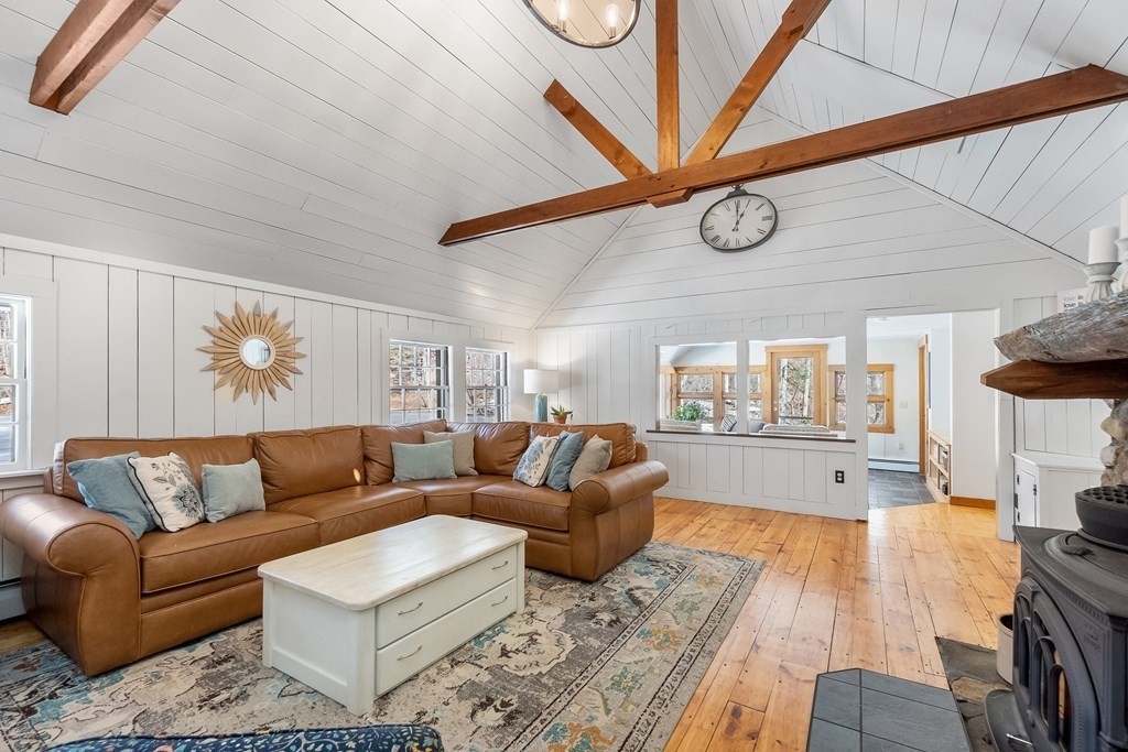 472 Sugar Road Bolton, MA 01740 - Photo 11 of 30 a living room with furniture and a wooden floor