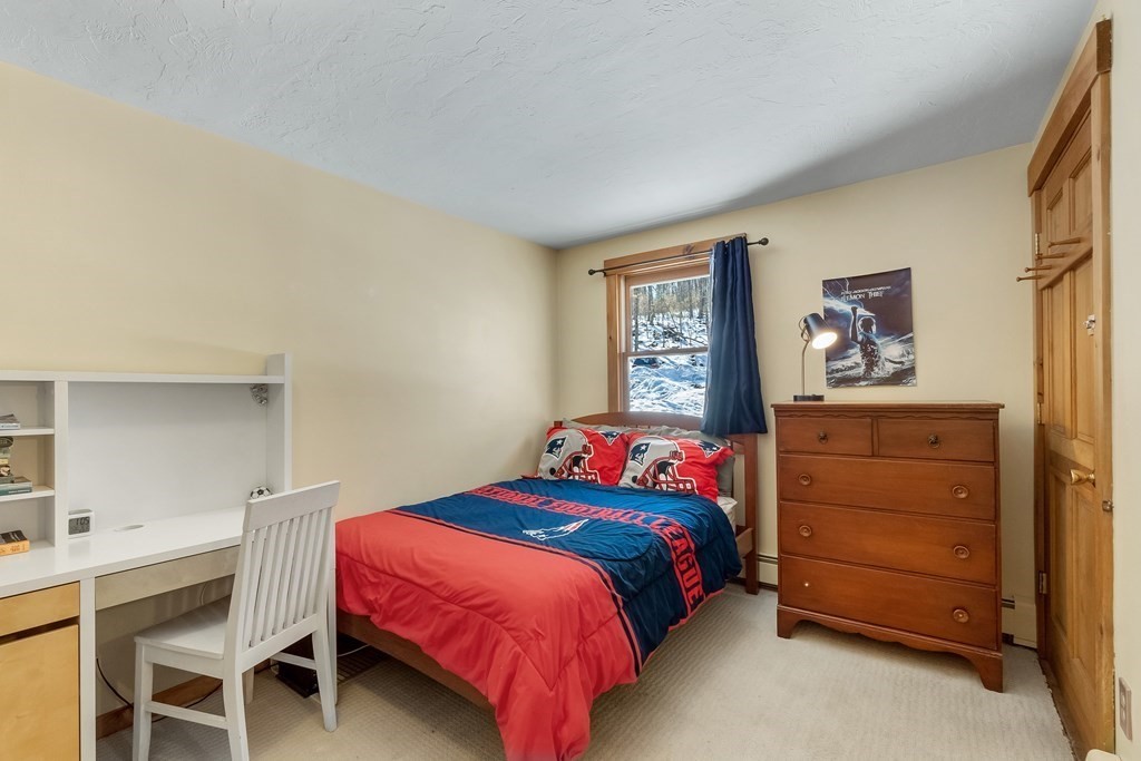 472 Sugar Road Bolton, MA 01740 - Photo 19 of 30 a bedroom with a bed and furniture