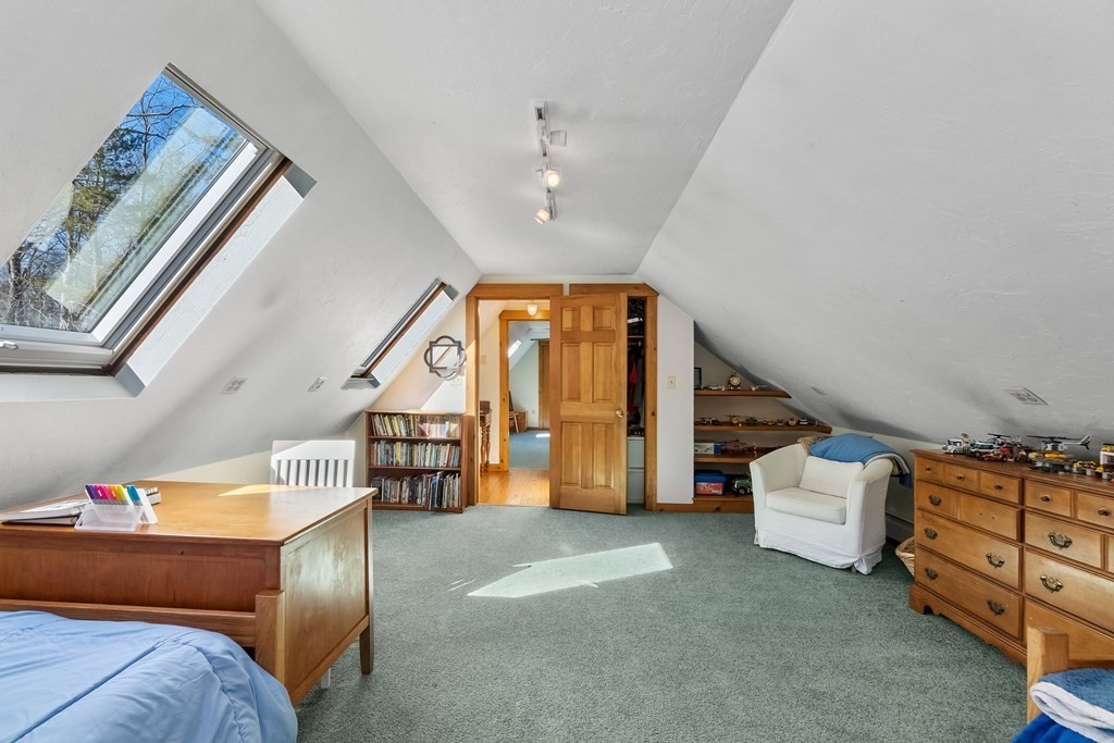 472 Sugar Road Bolton, MA 01740 - Photo 22 of 30 a living room with furniture and stairs