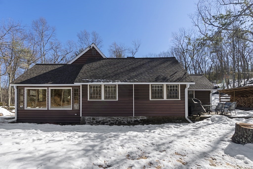 472 Sugar Road Bolton, MA 01740 - Photo 23 of 30 a front view of a house with a yard