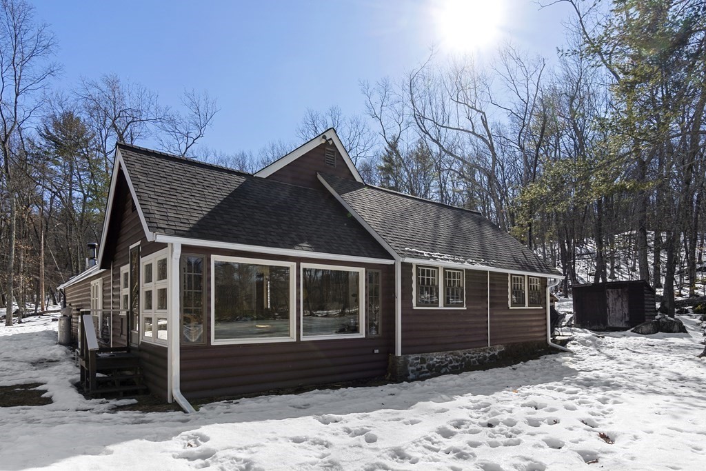 472 Sugar Road Bolton, MA 01740 - Photo 24 of 30 a view of a house with a yard