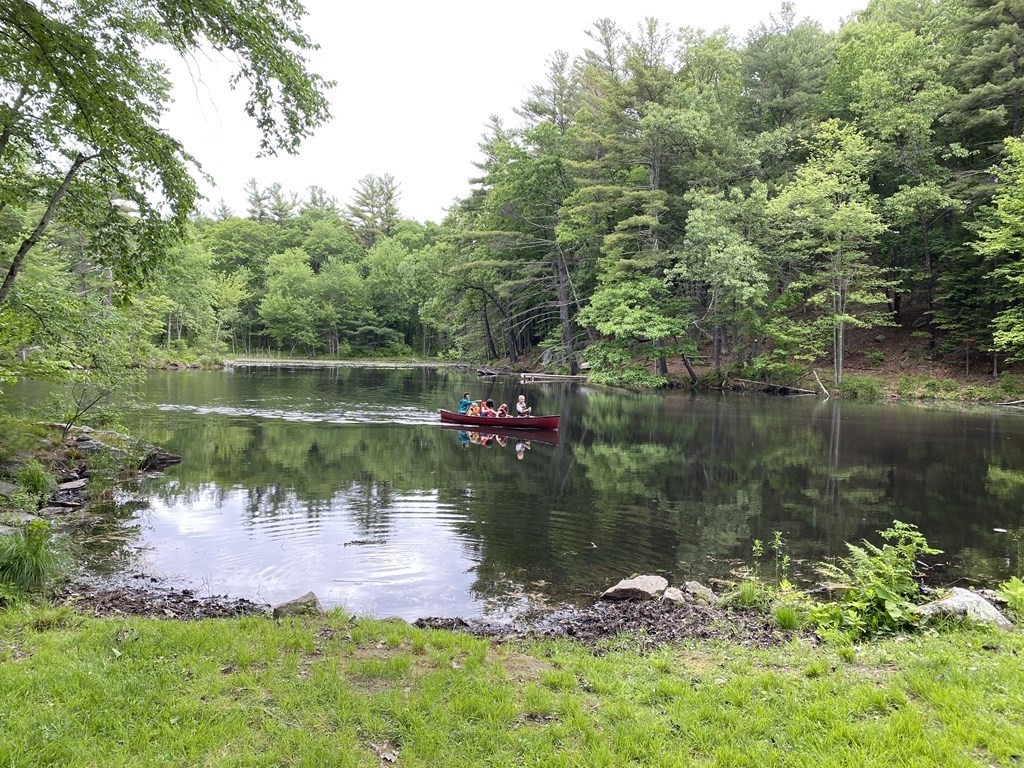 472 Sugar Road Bolton, MA 01740 - Photo 27 of 30 a lake view with a garden