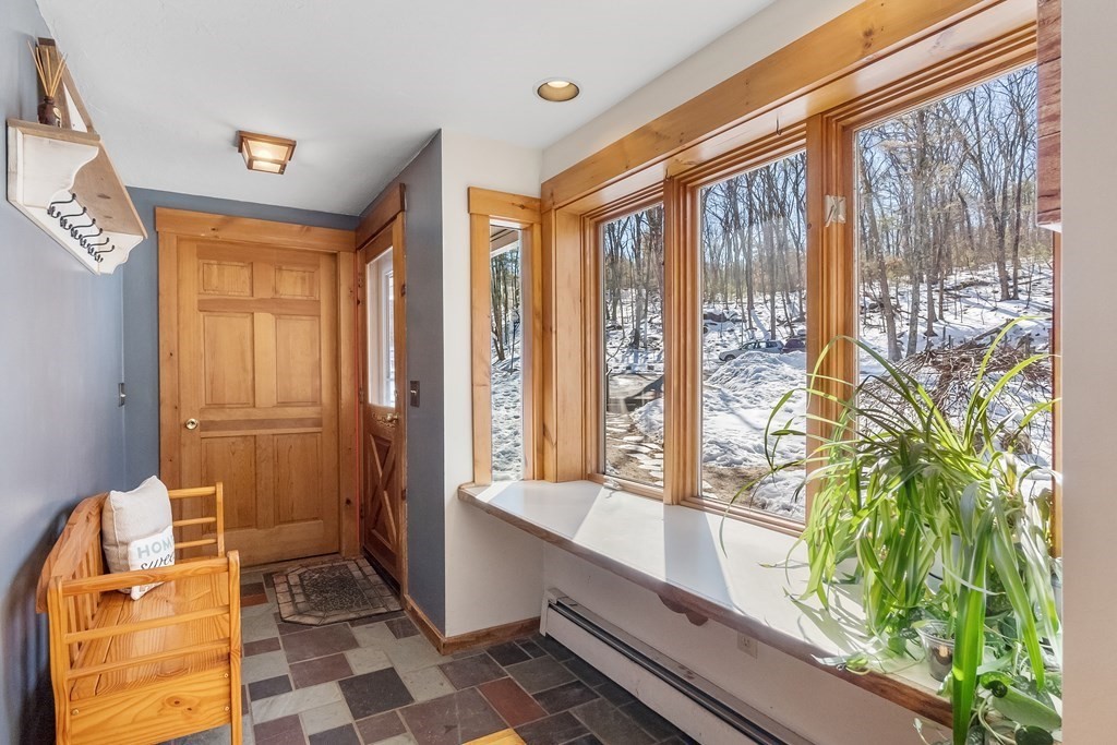 472 Sugar Road Bolton, MA 01740 - Photo 3 of 30 a bathroom with a large window and a shower