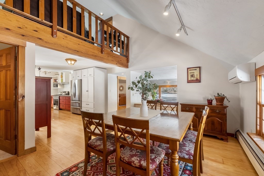 472 Sugar Road Bolton, MA 01740 - Photo 5 of 30 a view of a dining room with furniture