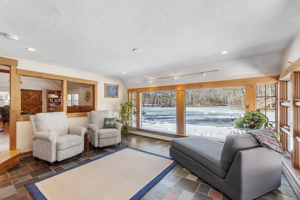 472 Sugar Road Bolton, MA 01740 - Photo 8 of 30 a living room with furniture and a large window