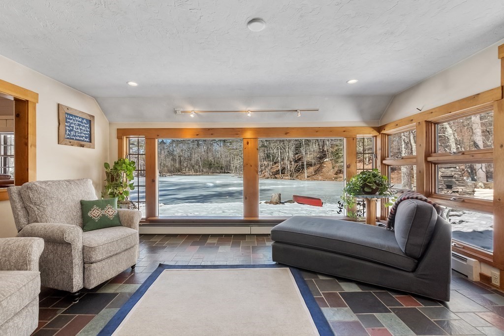 472 Sugar Road Bolton, MA 01740 - Photo 9 of 30 a living room with furniture and a large window