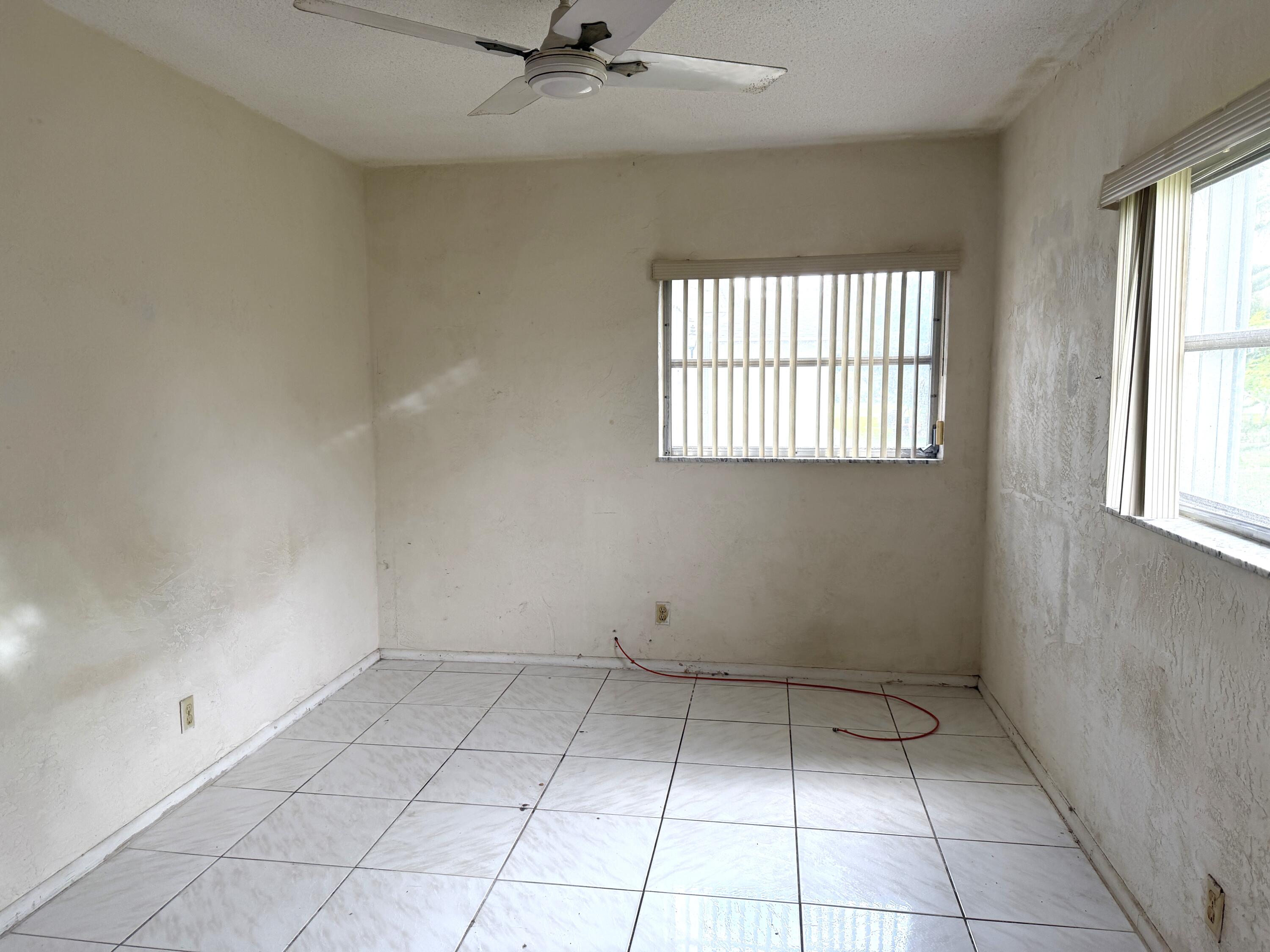 9210 Northwest 73rd Street Tamarac, FL 33321 - Photo 7 of 8 a view of room and window