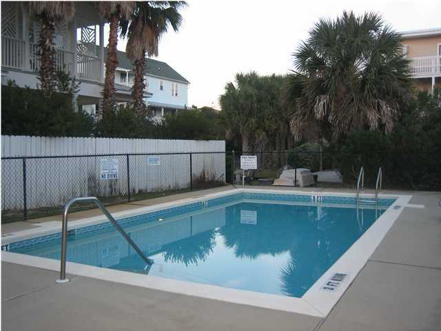 191 Blue Mountain Beach Road, Unit 303 Santa Rosa Beach, FL 32459 - Photo 16 of 20 a view of a swimming pool with a chair