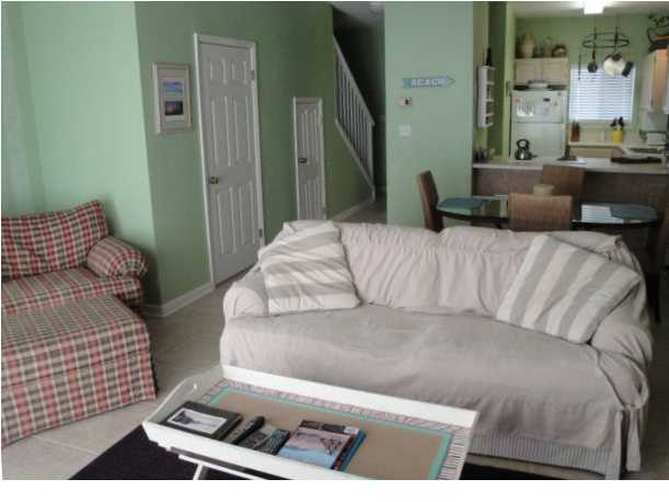 191 Blue Mountain Beach Road, Unit 303 Santa Rosa Beach, FL 32459 - Photo 3 of 20 a living room with a couch
