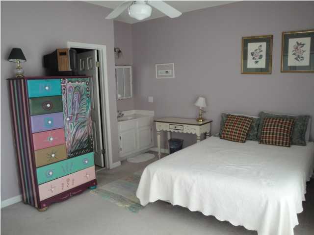191 Blue Mountain Beach Road, Unit 303 Santa Rosa Beach, FL 32459 - Photo 9 of 20 a bedroom with a bed and a tv