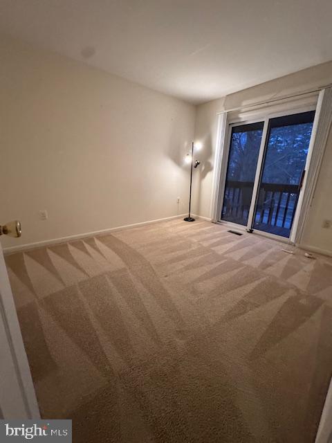 5312 Eliots Oak Road Columbia, MD 21044 - Photo 16 of 26 2nd bedroom with large patio