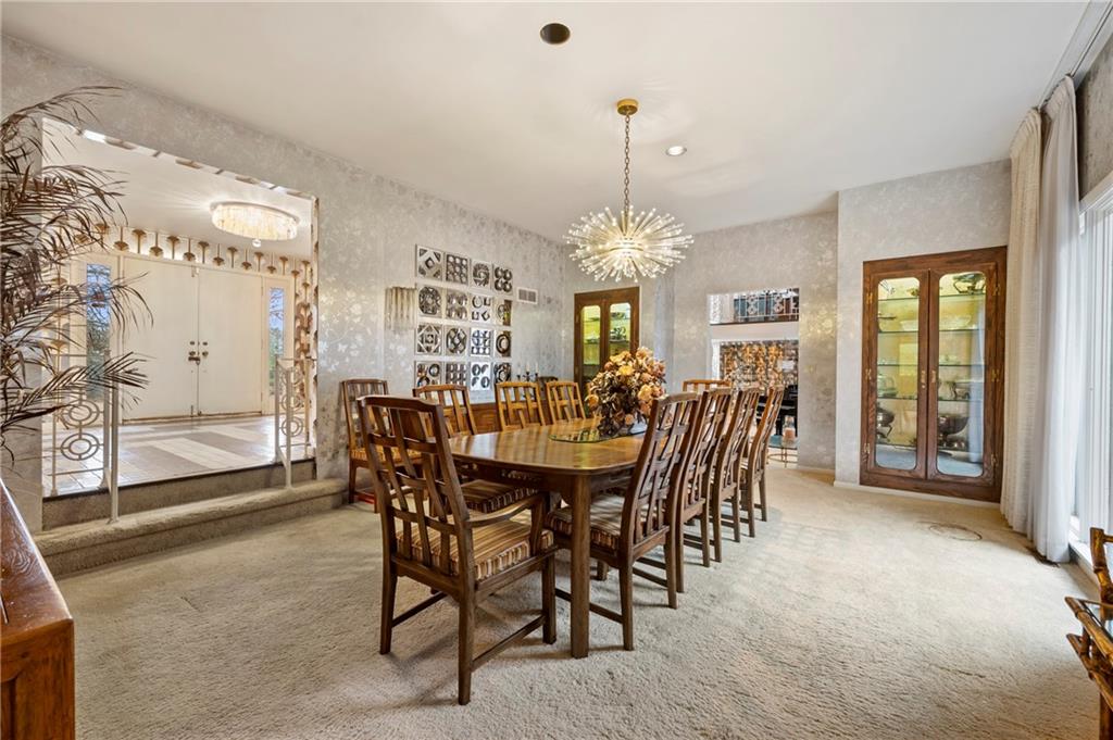 111 Morrow Road Beaver Falls, PA 15010 - Photo 11 of 50 a view of a dining room with furniture and chandelier