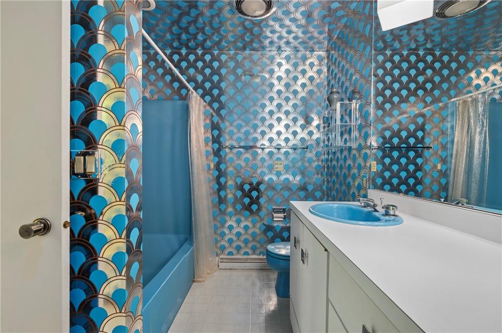 111 Morrow Road Beaver Falls, PA 15010 - Photo 29 of 50 a bathroom with a sink and a shower curtain