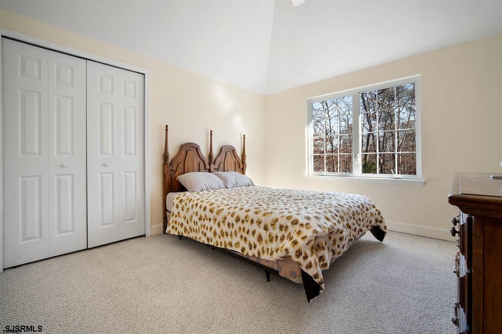 301-315 South Pitney Road Galloway Township, NJ 08205 - Photo 17 of 24 a bedroom with a bed and a window