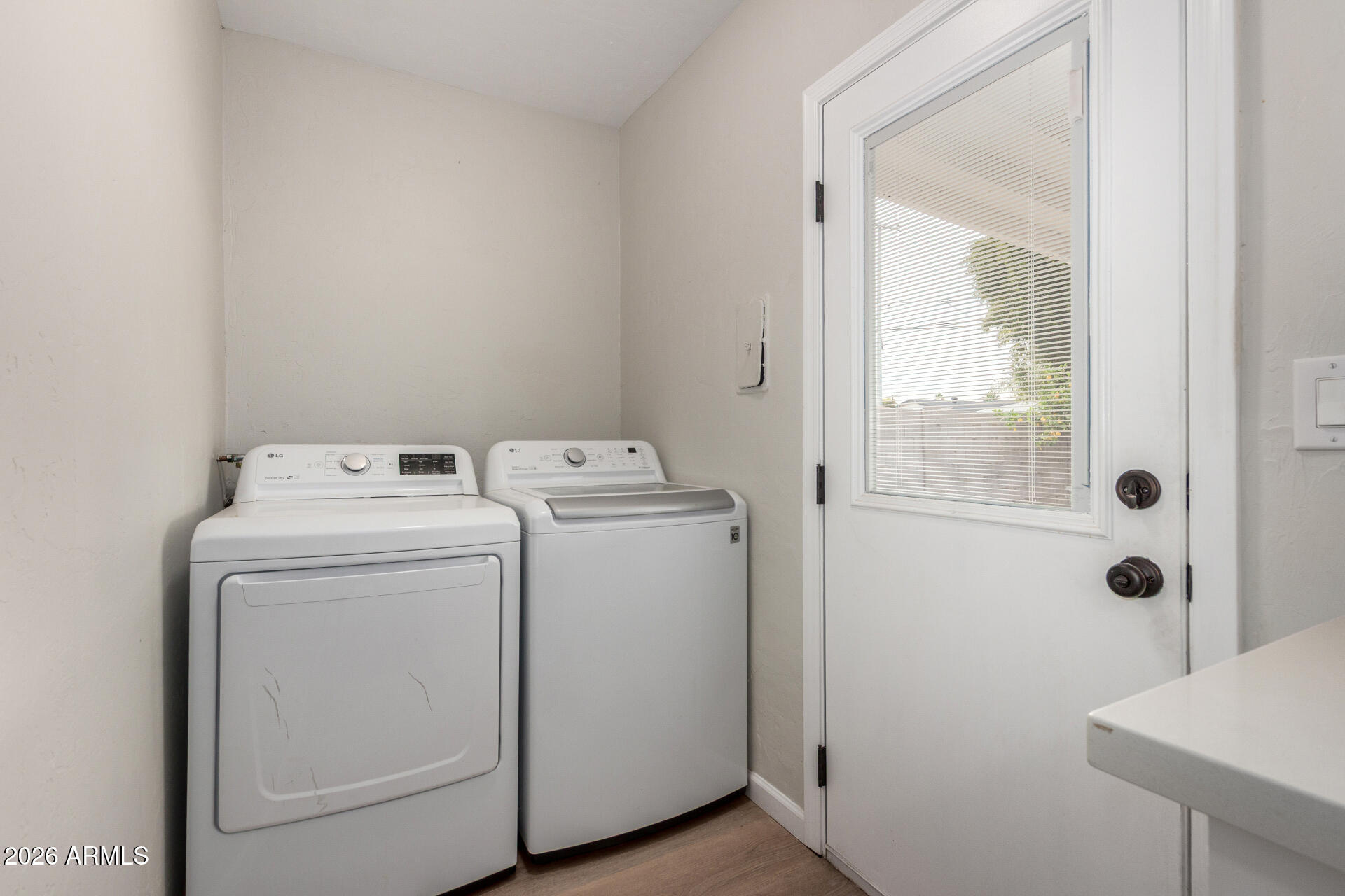 4010 North 11th Avenue Phoenix, AZ 85013 - Photo 19 of 22 a utility room with dryer and washer