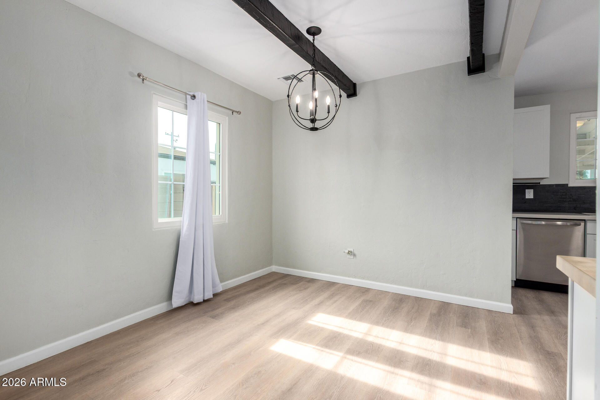 4010 North 11th Avenue Phoenix, AZ 85013 - Photo 5 of 22 a view of room with window and ceiling fan