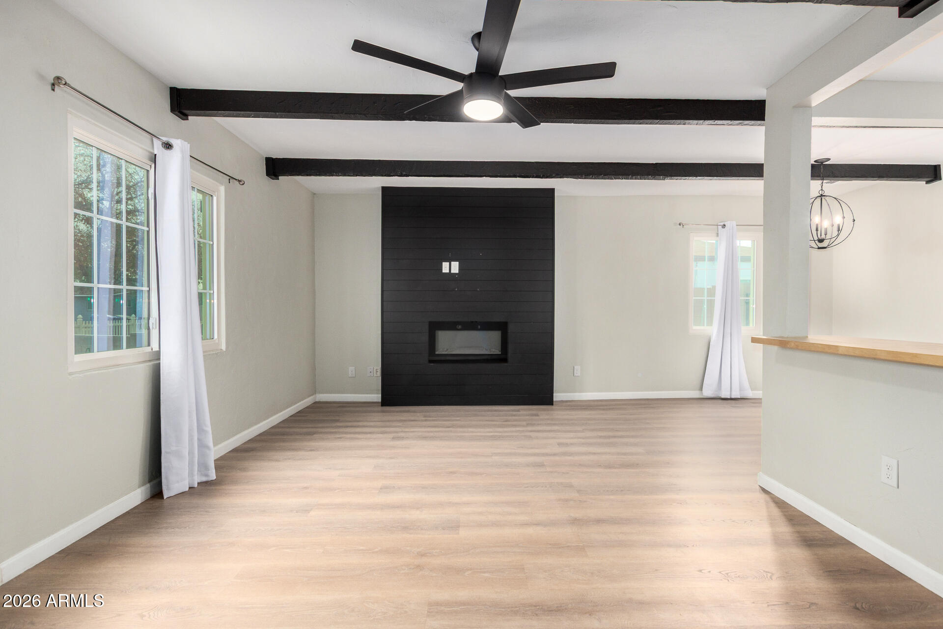 4010 North 11th Avenue Phoenix, AZ 85013 - Photo 8 of 22 a view of an empty room with a window