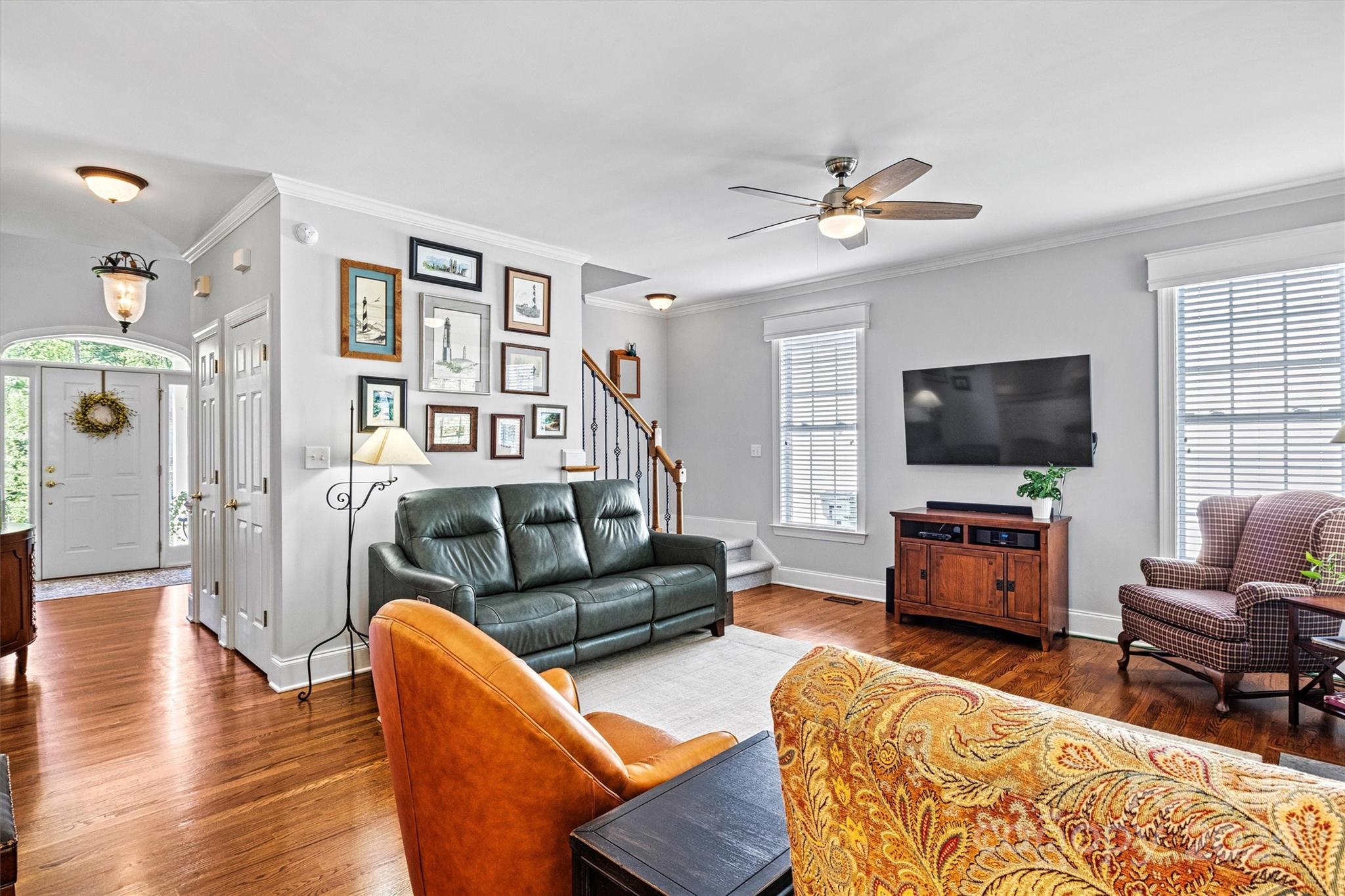 21329 Summerbrook Drive Cornelius, NC 28031 - Photo 13 of 46 a living room with furniture and a flat screen tv