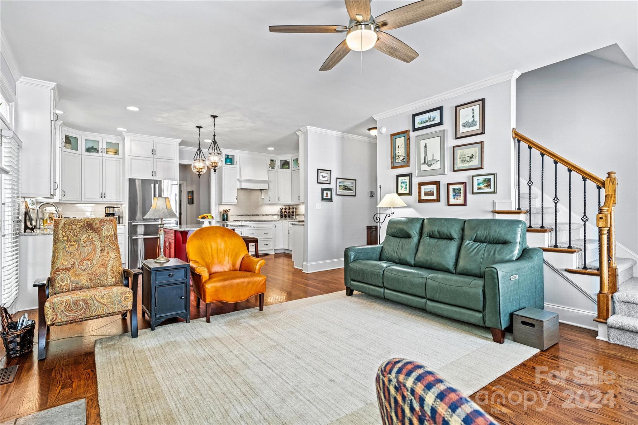 21329 Summerbrook Drive Cornelius, NC 28031 - Photo 15 of 46 a bedroom with furniture and a chandelier