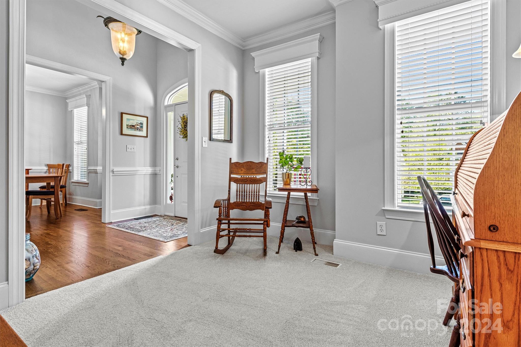 21329 Summerbrook Drive Cornelius, NC 28031 - Photo 19 of 46 a view of a livingroom with furniture and windows