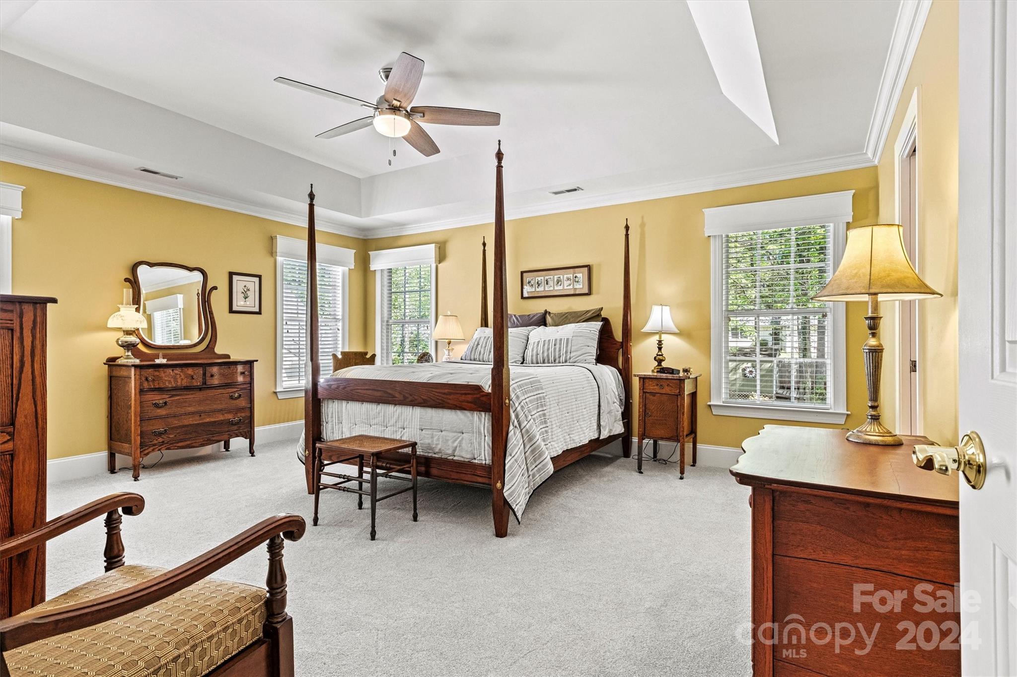 21329 Summerbrook Drive Cornelius, NC 28031 - Photo 21 of 46 a bedroom with a bed desk and a window