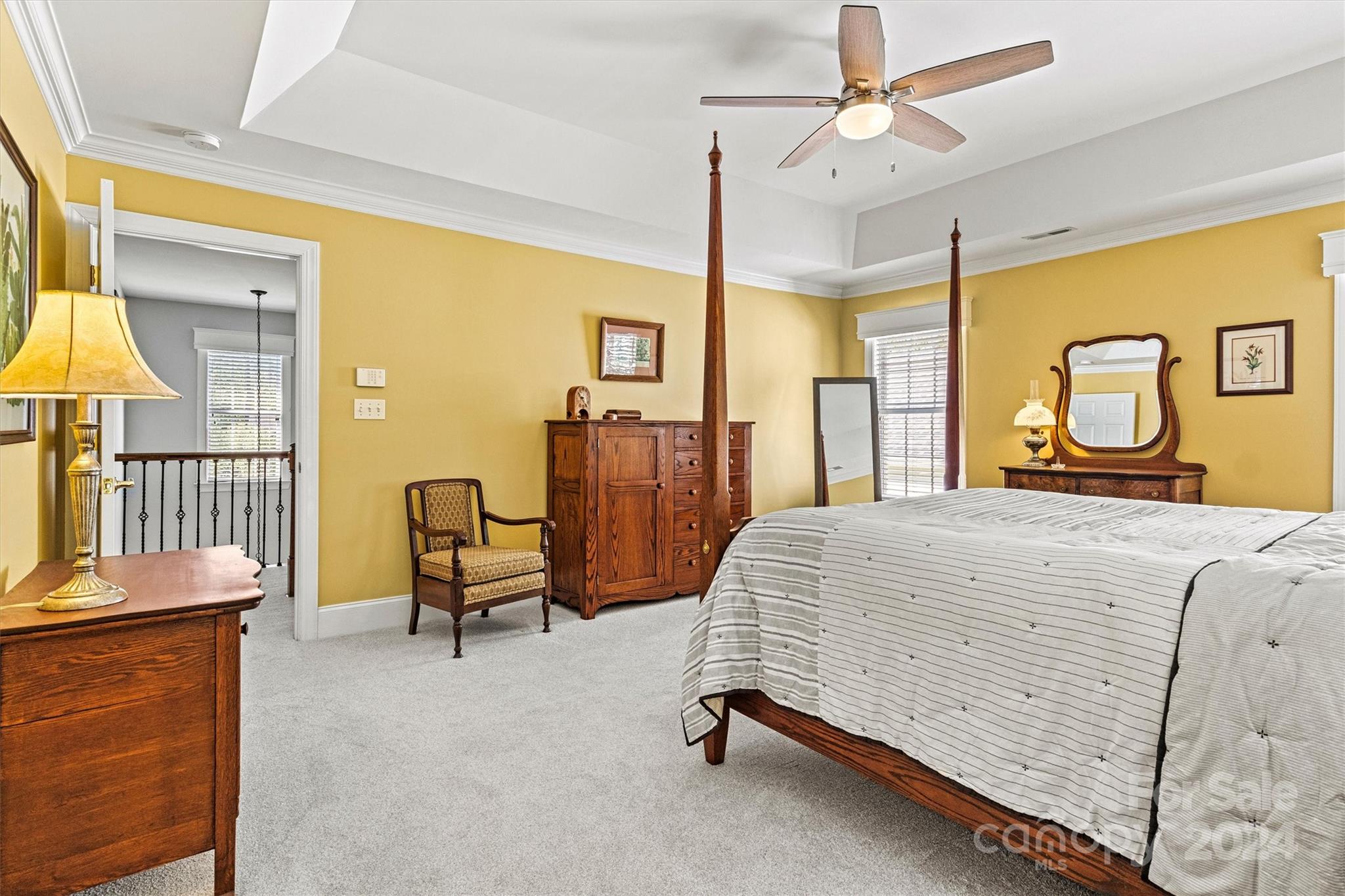 21329 Summerbrook Drive Cornelius, NC 28031 - Photo 23 of 46 a bedroom with a bed dresser and a window