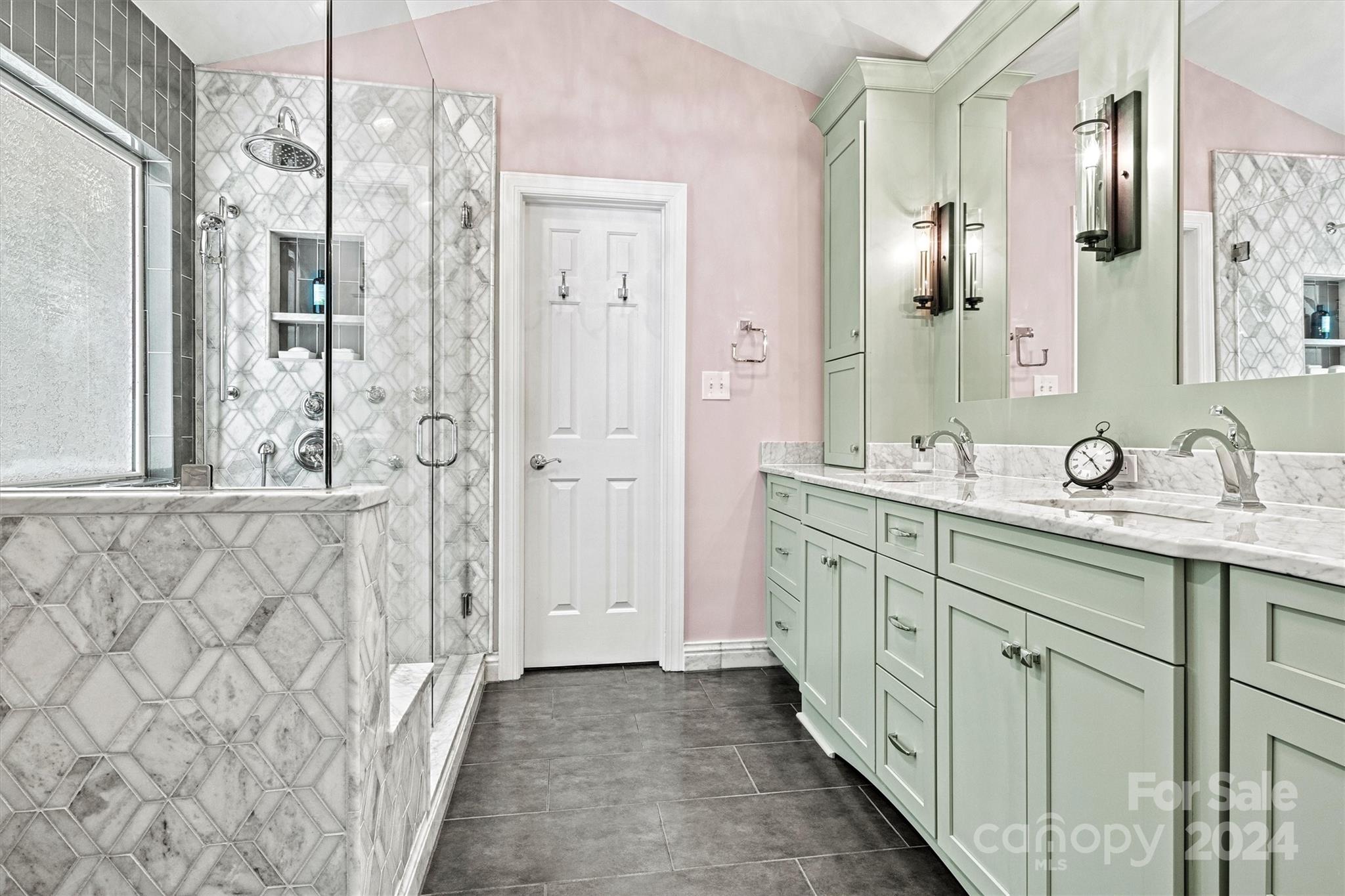 21329 Summerbrook Drive Cornelius, NC 28031 - Photo 25 of 46 a bathroom with double vanity sink and mirror
