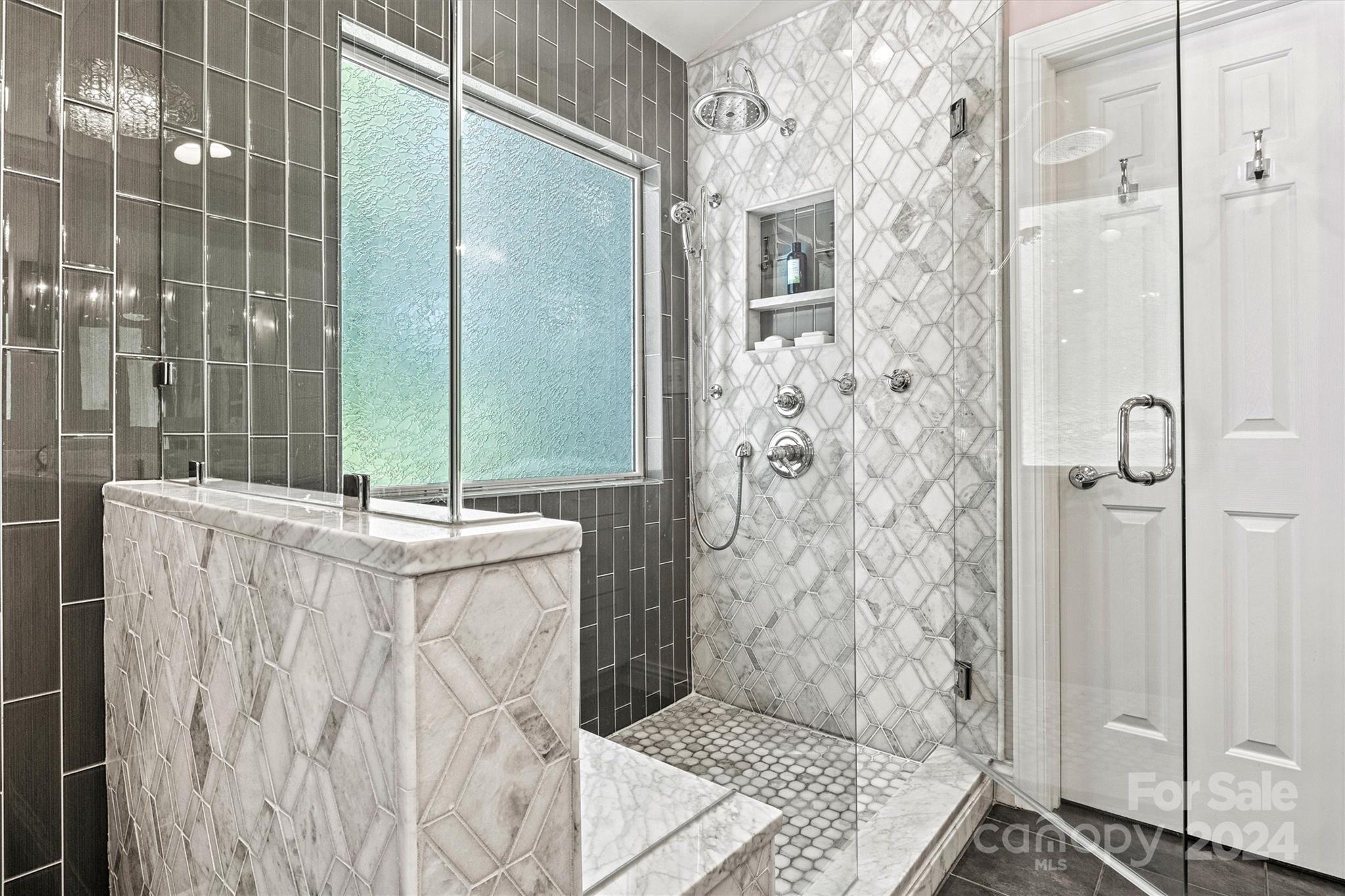 21329 Summerbrook Drive Cornelius, NC 28031 - Photo 26 of 46 a bathroom with a shower and a sink