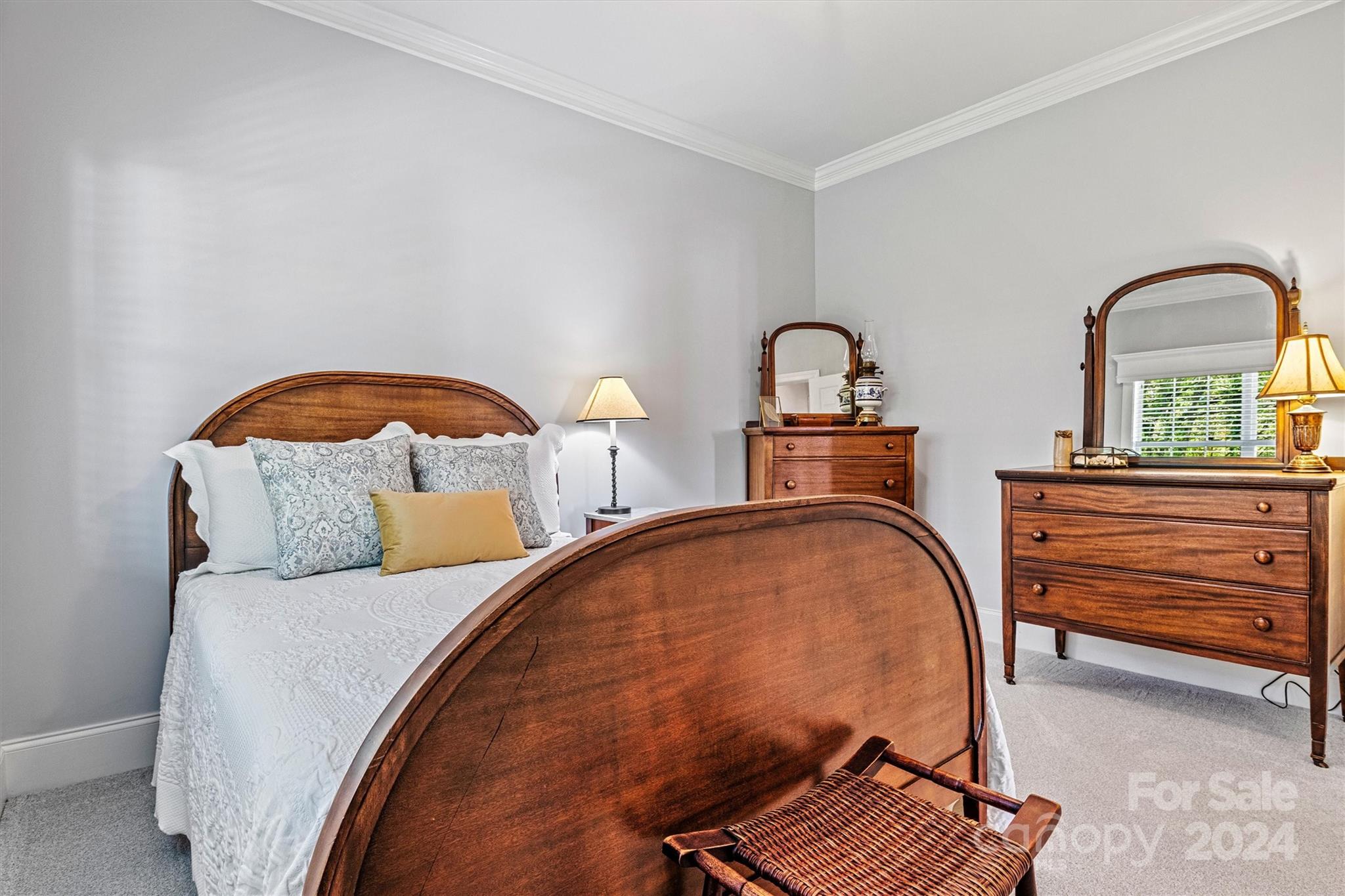 21329 Summerbrook Drive Cornelius, NC 28031 - Photo 28 of 46 a bedroom with a bed and dresser