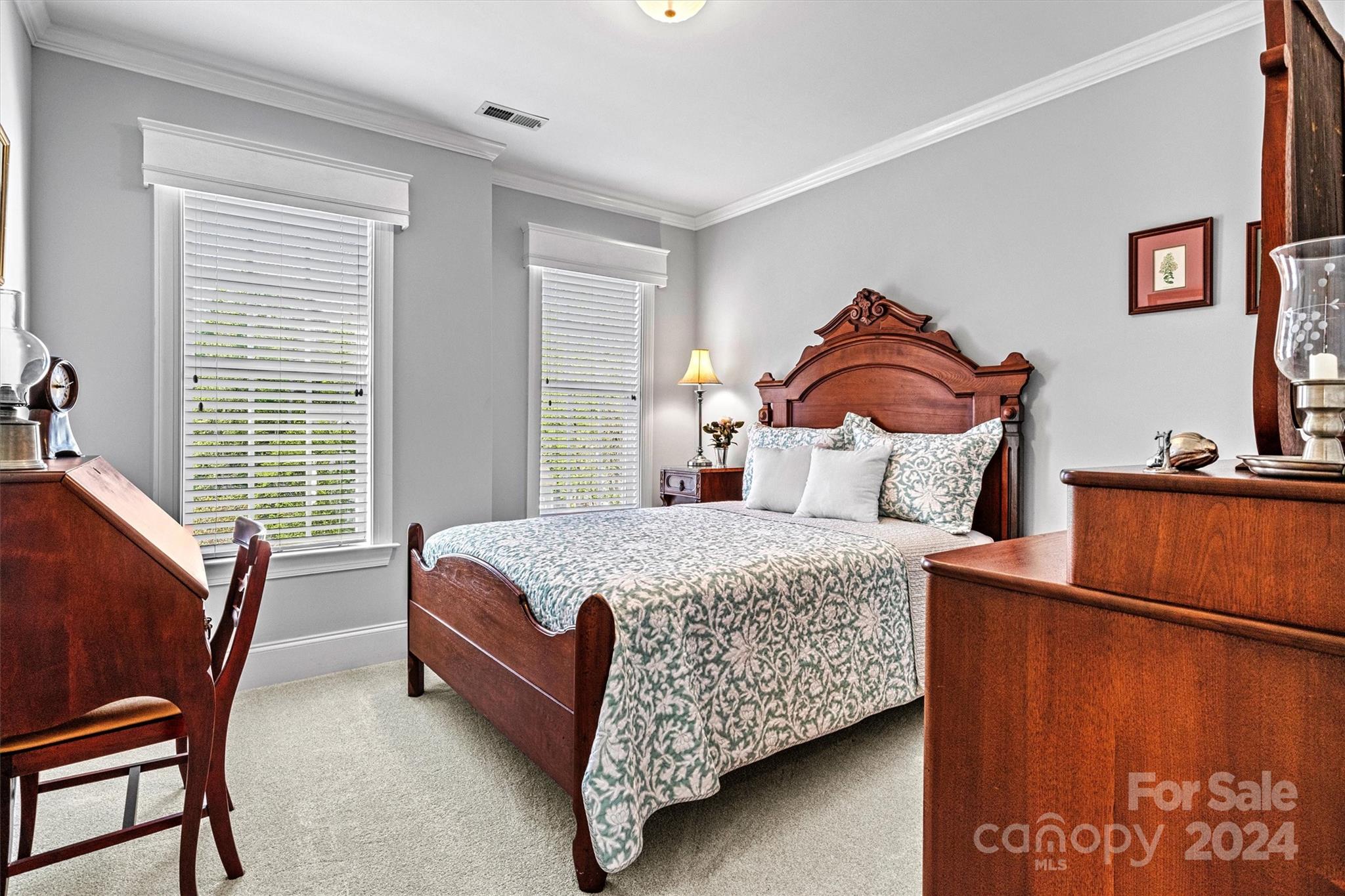 21329 Summerbrook Drive Cornelius, NC 28031 - Photo 31 of 46 a bedroom with a bed and window