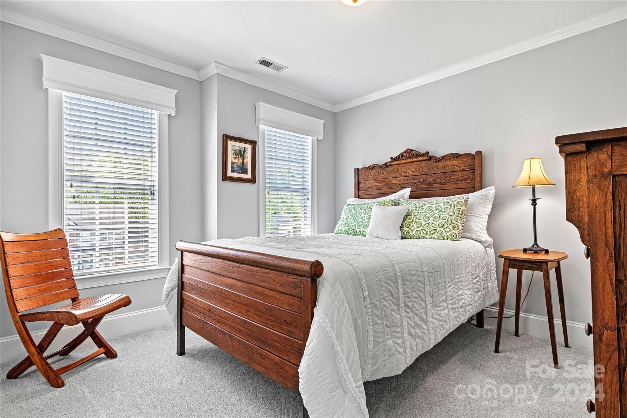 21329 Summerbrook Drive Cornelius, NC 28031 - Photo 34 of 46 a bedroom with furniture and a window