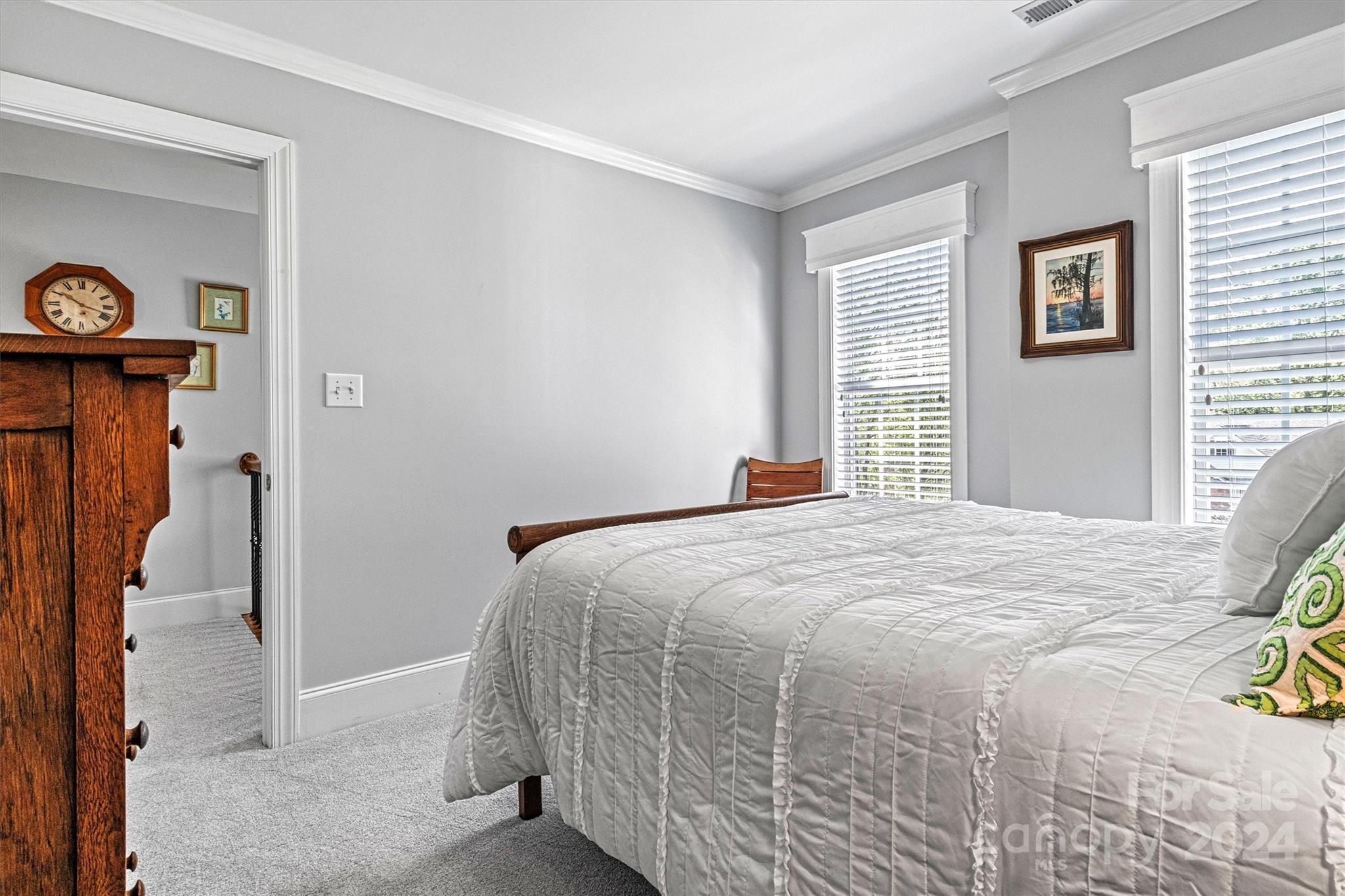 21329 Summerbrook Drive Cornelius, NC 28031 - Photo 35 of 46 a bedroom with a bed and a window