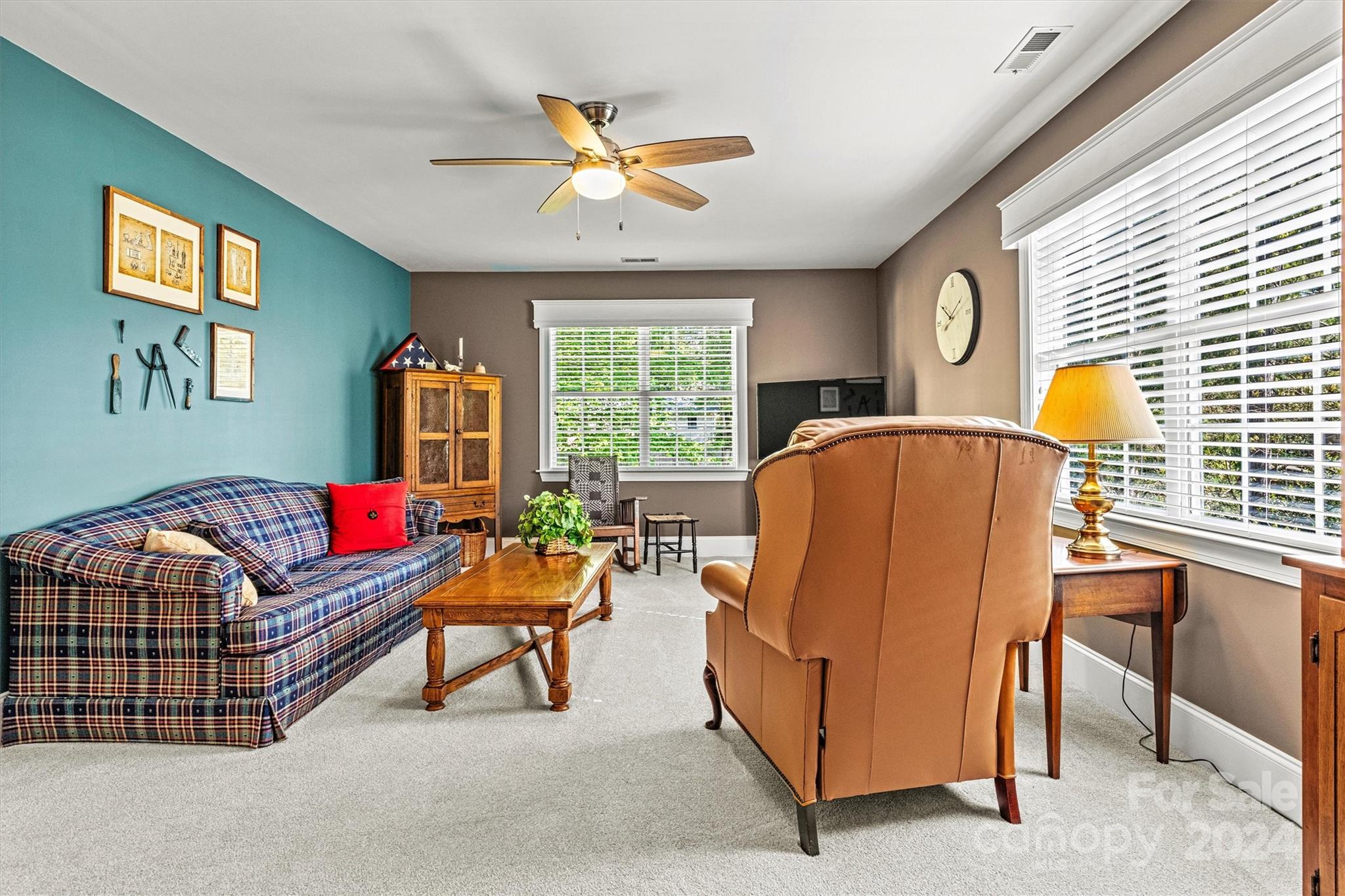 21329 Summerbrook Drive Cornelius, NC 28031 - Photo 39 of 46 a living room with furniture and a window