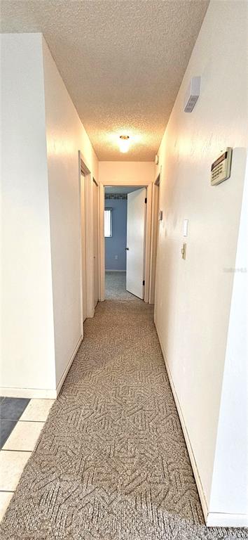 8449 Southwest 106th Place Ocala, FL 34481 - Photo 8 of 37 a view of hallway