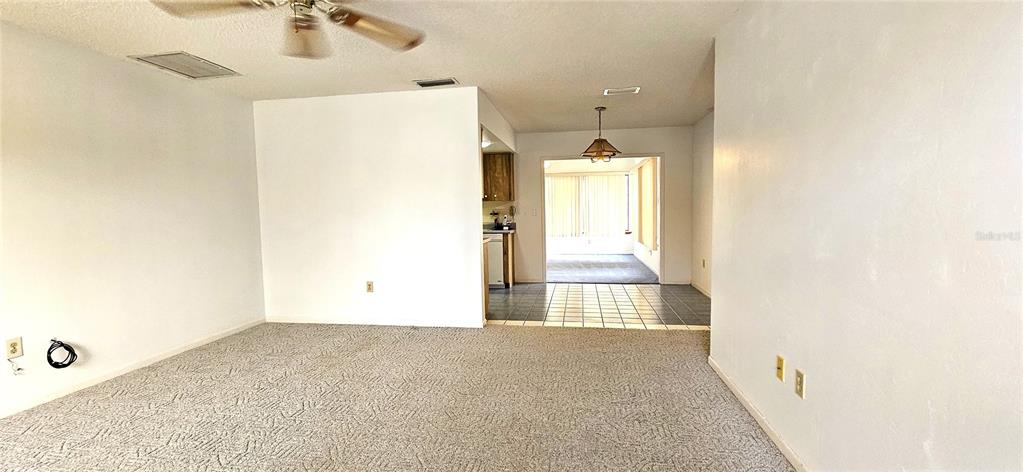 8449 Southwest 106th Place Ocala, FL 34481 - Photo 9 of 37 a view of an empty room