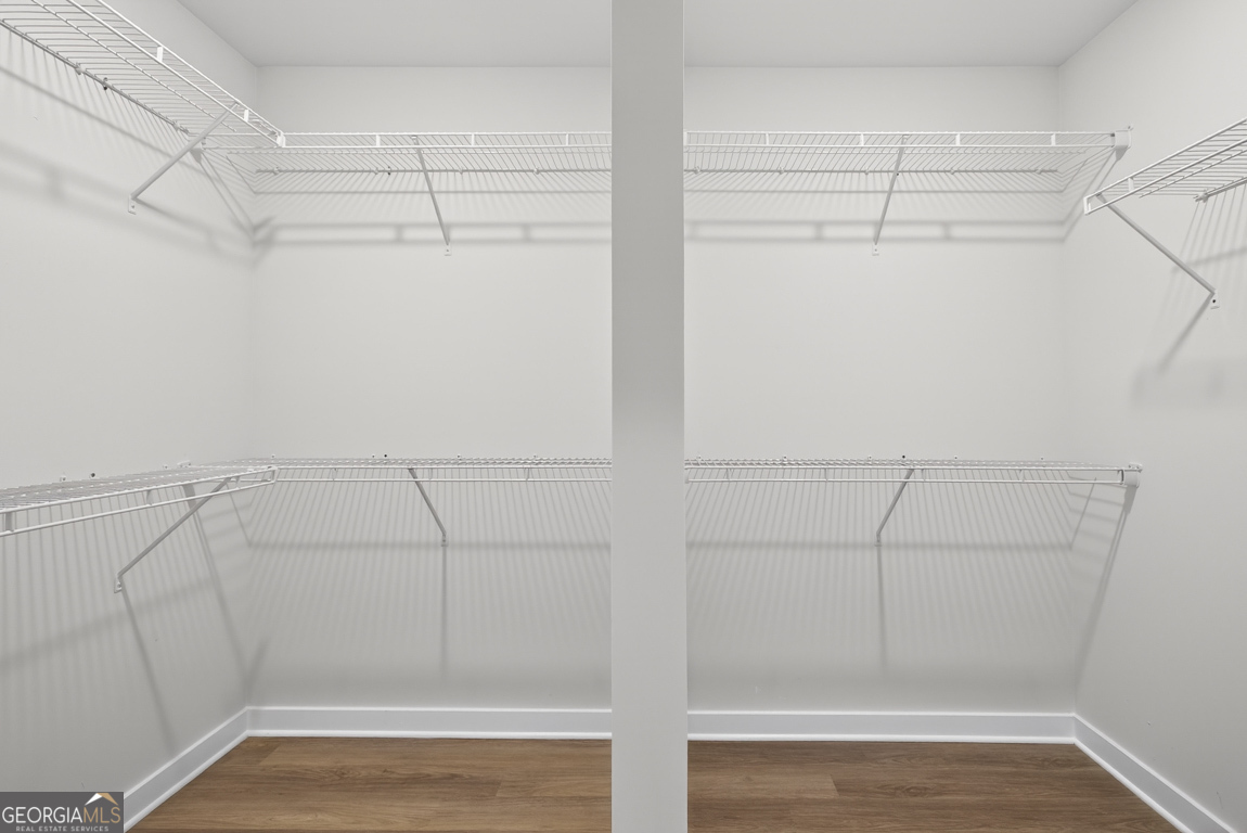 198 Mockingbird Lane, Unit 30 Winder, GA 30680 - Photo 26 of 39 a view of a room with racks on the wall