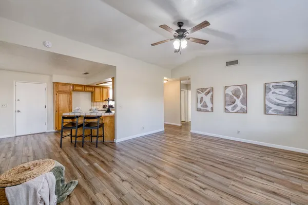a view of livingroom with furniture and wooden floor