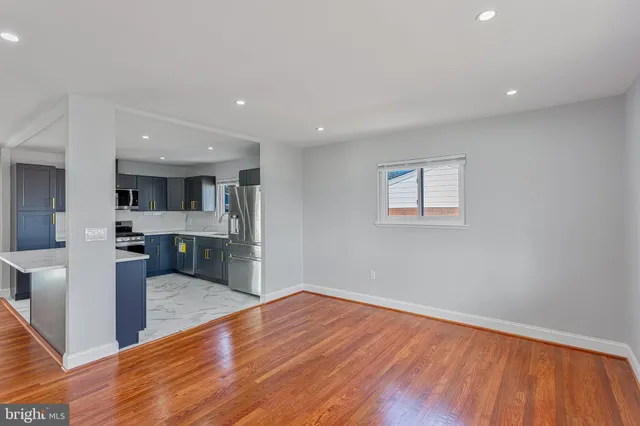 a view of kitchen with wooden floor
