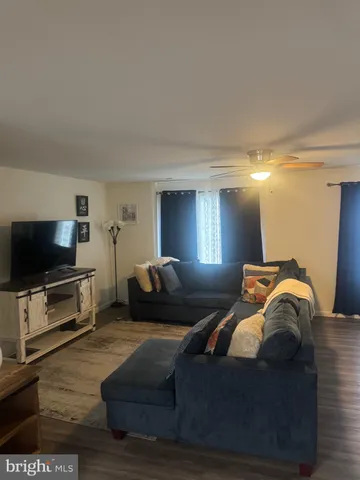 a bedroom with bed and window