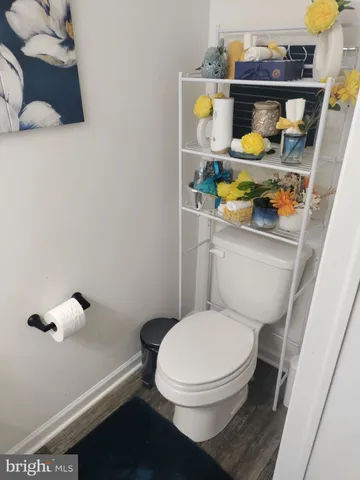 a bathroom with a toilet and a sink