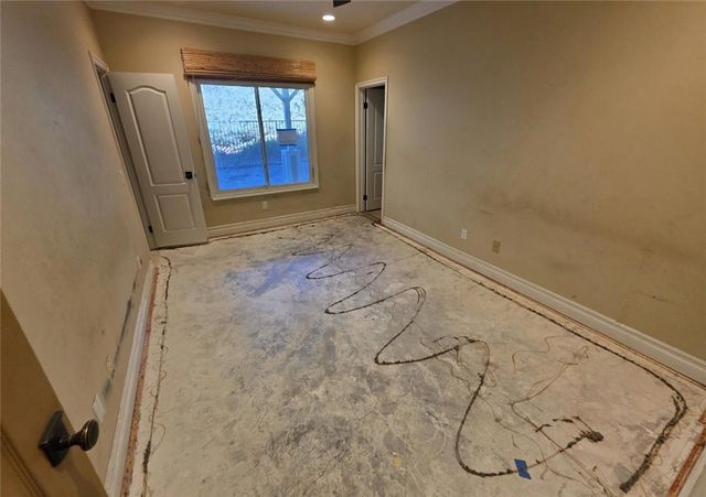 a view of storage and utility room with a sink