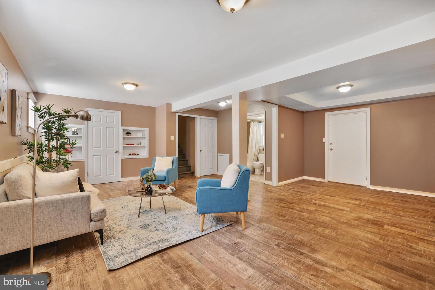 1204 Ednor Road Silver Spring, MD 20905 - Photo 14 of 27 a living room with furniture and a couch