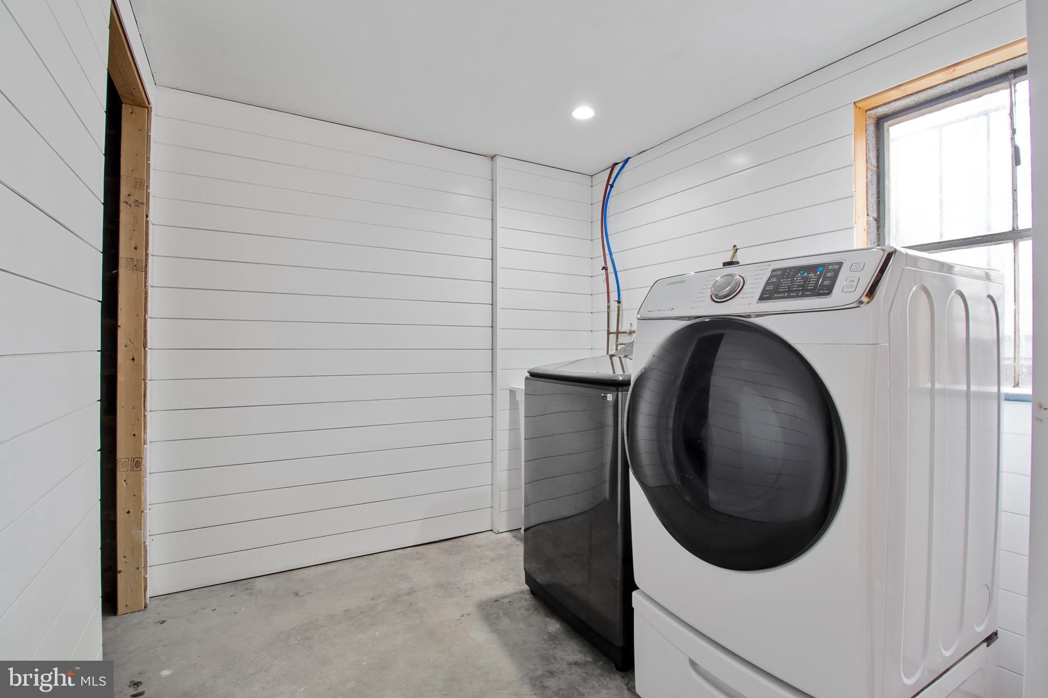 1204 Ednor Road Silver Spring, MD 20905 - Photo 17 of 27 a utility room with dryer and washer