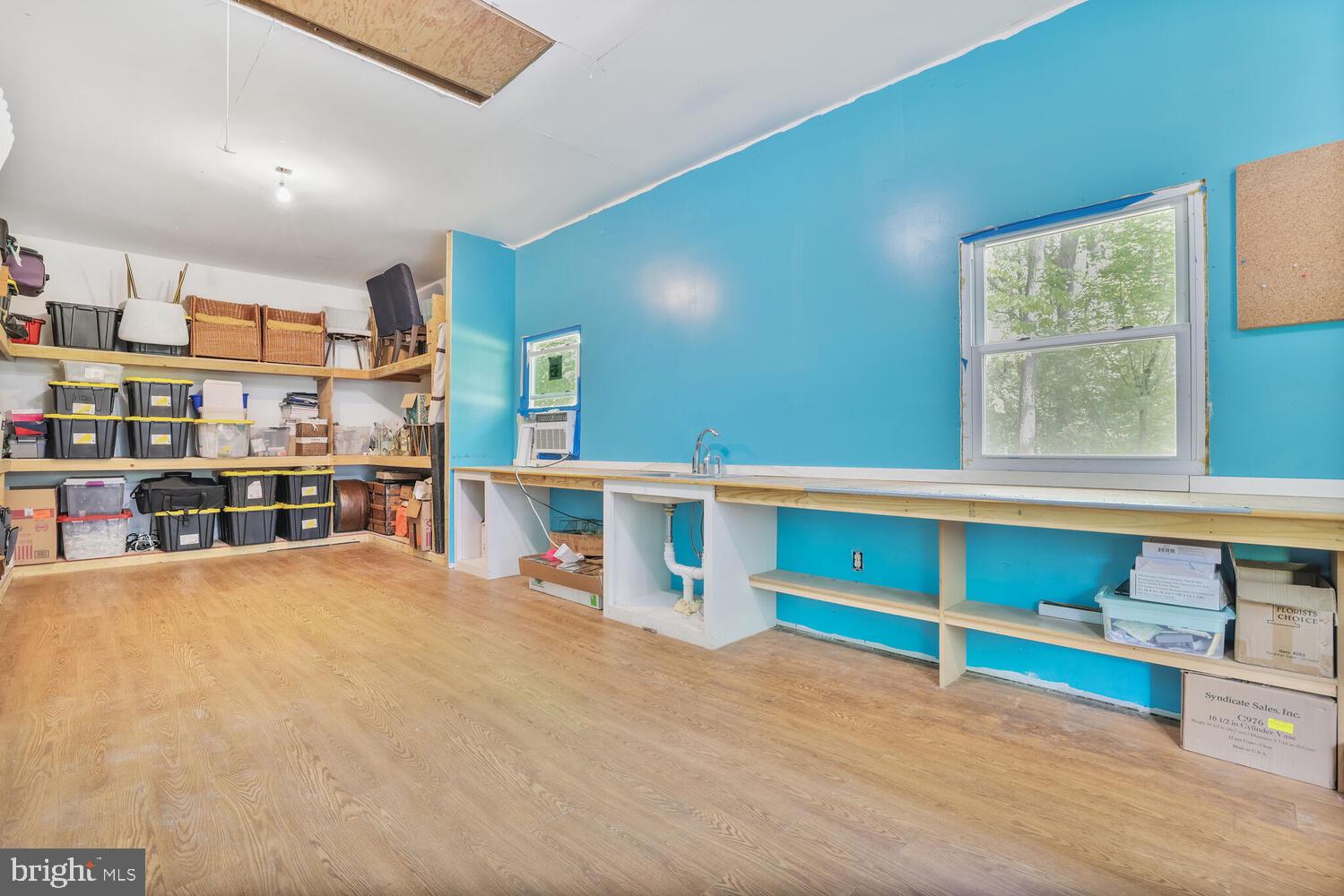 1204 Ednor Road Silver Spring, MD 20905 - Photo 19 of 27 a view of an empty room with furniture and a window