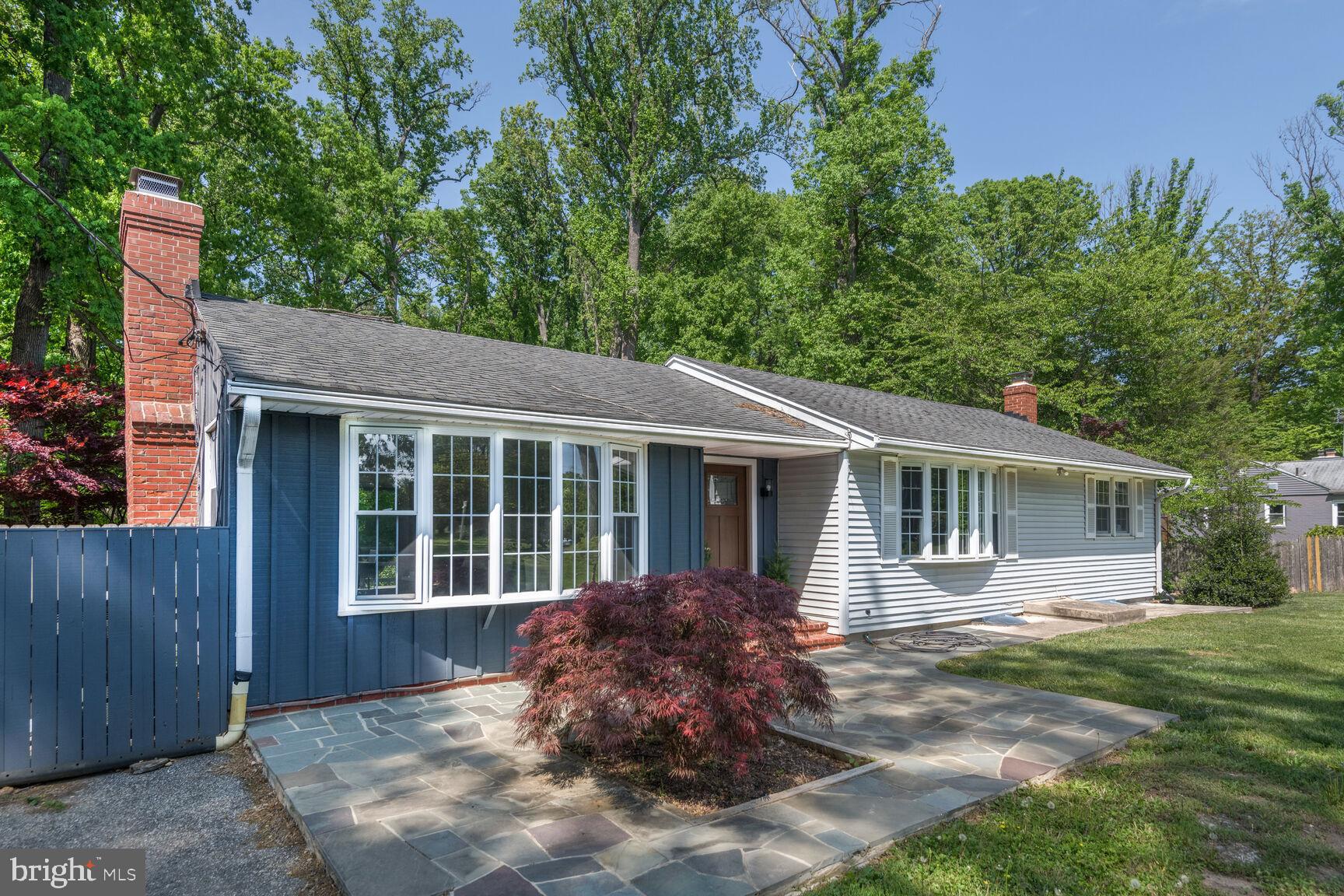 1204 Ednor Road Silver Spring, MD 20905 - Photo 2 of 27 front view of a house with a yard