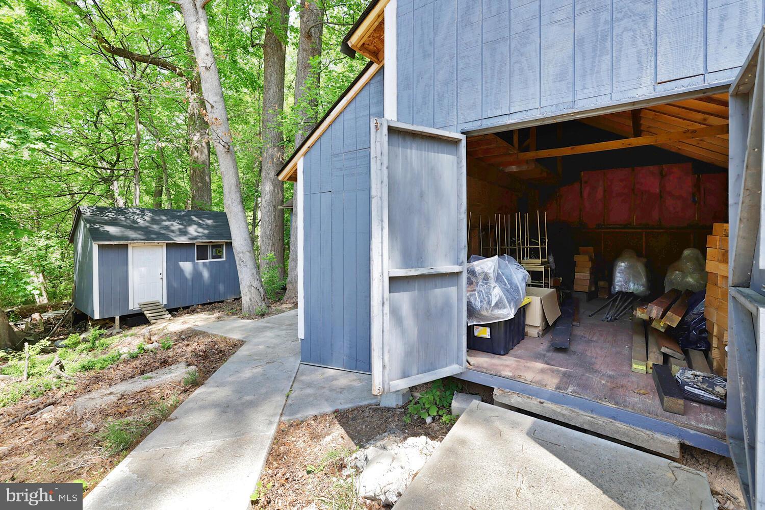 1204 Ednor Road Silver Spring, MD 20905 - Photo 21 of 27 a front view of a house with garden