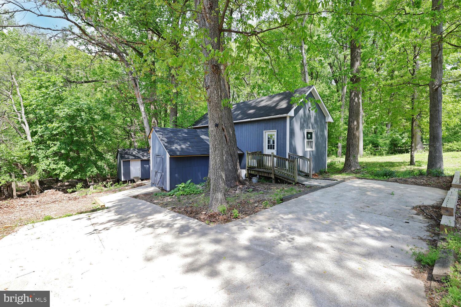 1204 Ednor Road Silver Spring, MD 20905 - Photo 23 of 27 a view of backyard of house with green space
