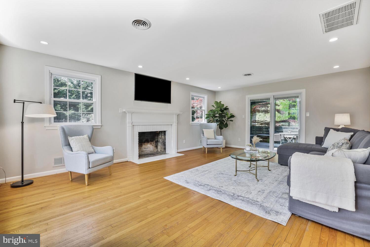 1204 Ednor Road Silver Spring, MD 20905 - Photo 5 of 27 a living room with furniture rug and window