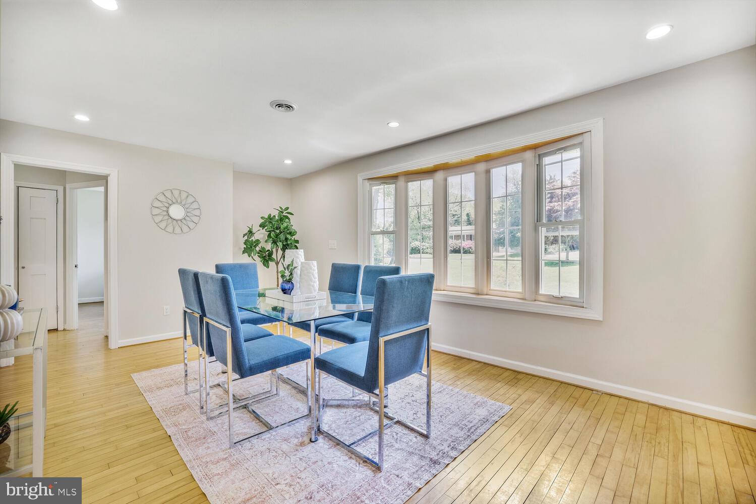 1204 Ednor Road Silver Spring, MD 20905 - Photo 8 of 27 a living room with furniture and wooden floor